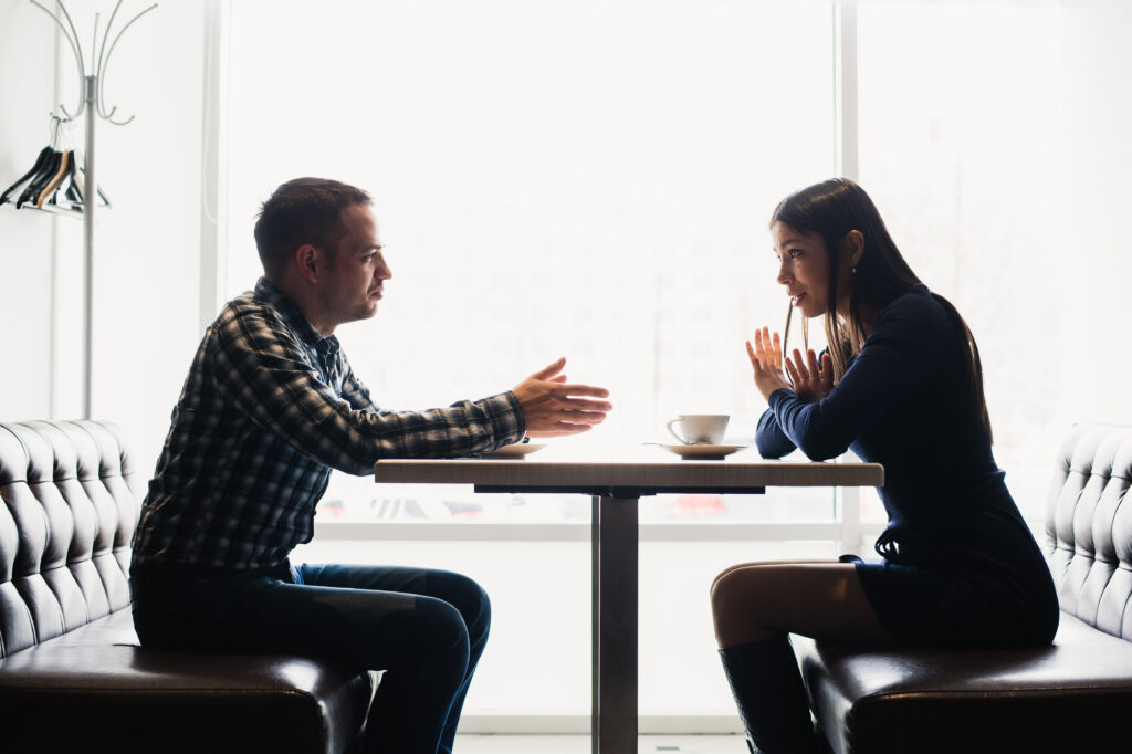 The Love Central - A couple discussing and resolving conflict at lunch. The Love Central -
