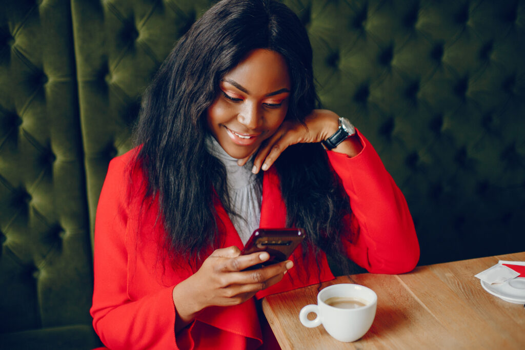 The Love Central - pretty black girl in a cafe The Love Central -