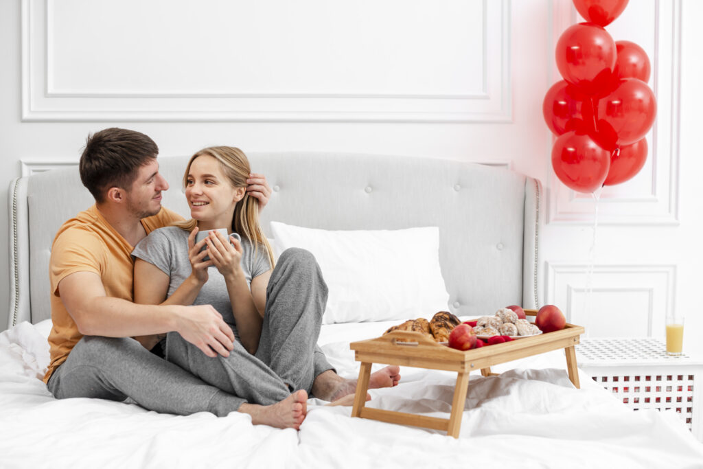 The Love Central - full-shot-happy-couple-bed-with-breakfast The Love Central -