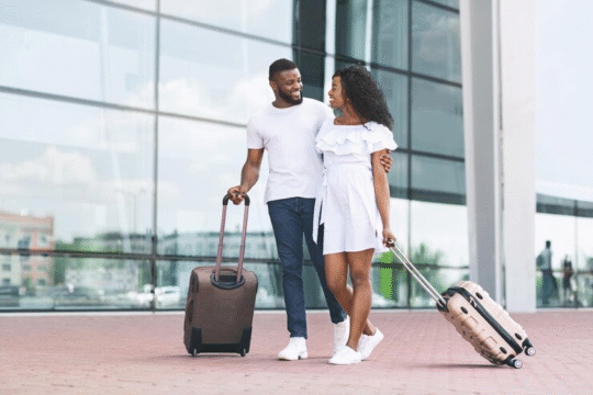 Couple with traveling bags