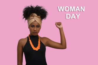 A beautiful black lady advocating for women power.