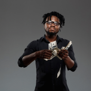 The Love Central - A black young man spraying money.