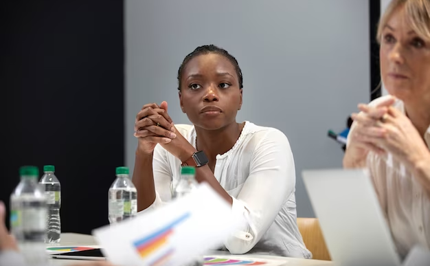 A beautiful black woman in a conference room