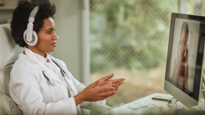 A therapist on a virtual therpay session with a patient.