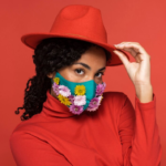 The Love Central - A beautiful black woman wearing nosemask.