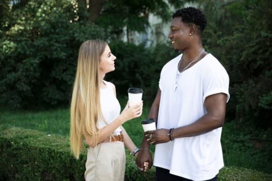 Couple staring deamily at each other.