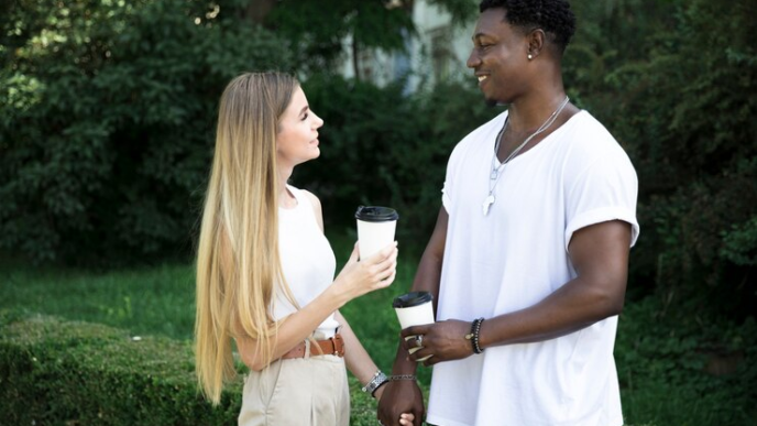 Couple staring deamily at each other.