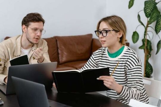 Couple synchronizing their schedules