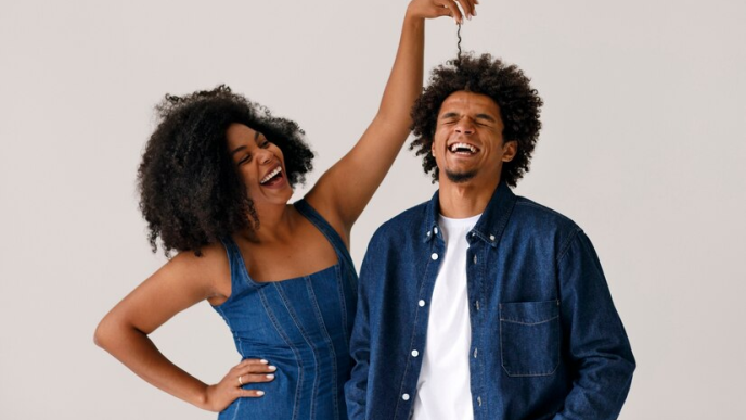 A cute and smiling black couple