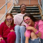 The Love Central - Teenagers playing and laughing together.