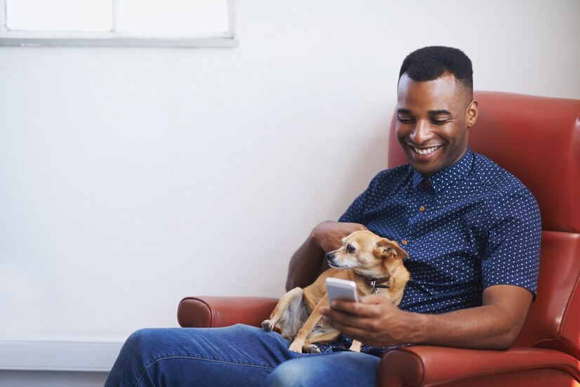 The Love Central - Feeling Left Out? Beat Summer Loneliness with These Tips The Love Central - A man with a pet dog