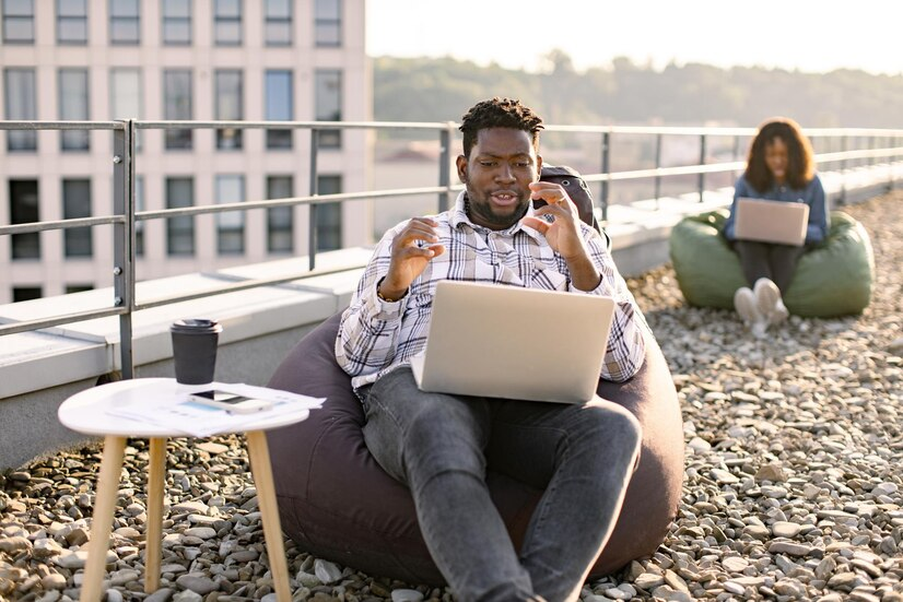 The Love Central - Unlock Your Potential: Top Skills for African Youth Succeeding in Canada The Love Central - An African youth on a virtual meeting