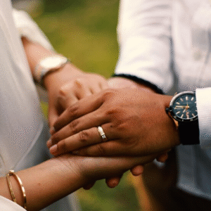 The Love Central - A couple holding hands.