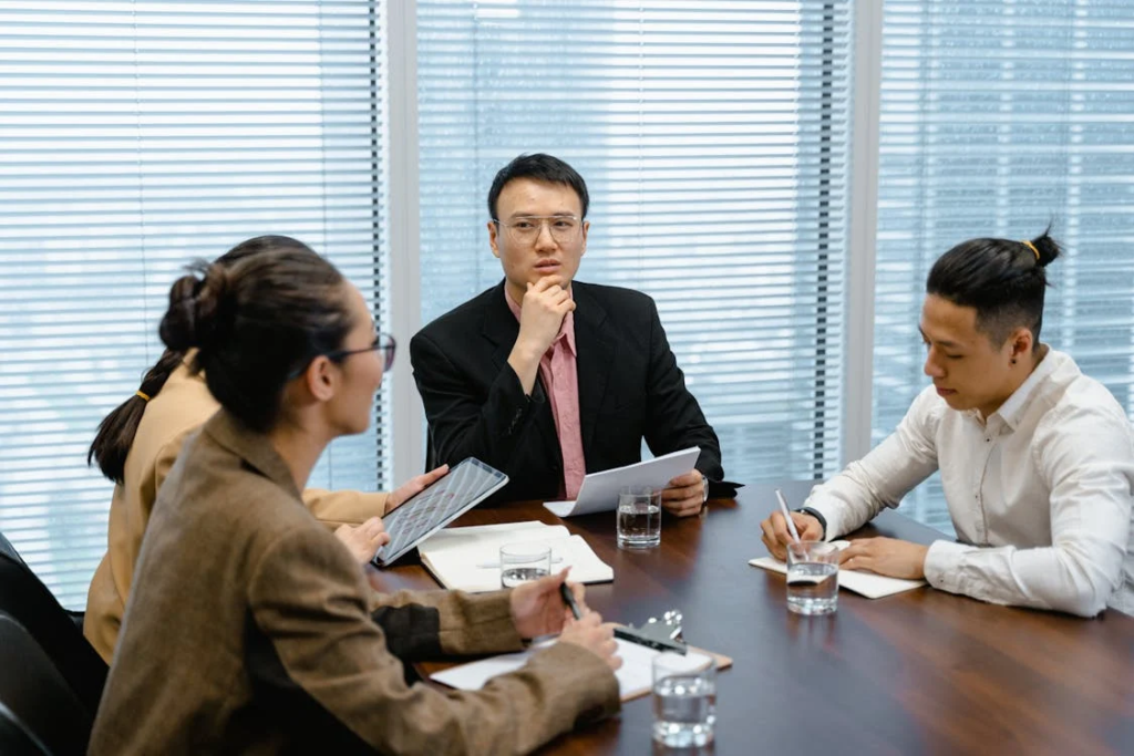 The Love Central - The Dangers of Blind Loyalty in the Workplace The Love Central - Workplace meeting