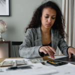 The Love Central - A cashier calculating workers wages