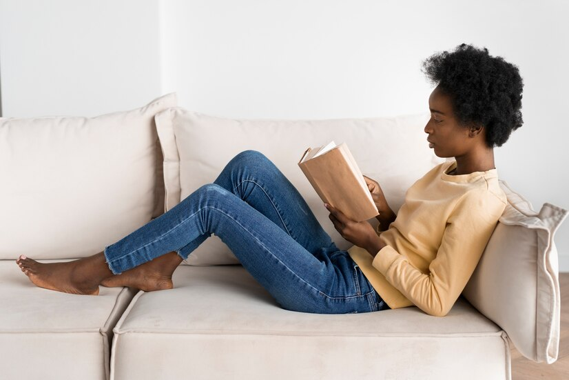 A young lady reading a book