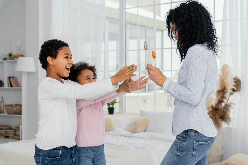 The Love Central - Supporting Your Child Through Friendship Changes: A Parent’s Guide Kids playing with their mom