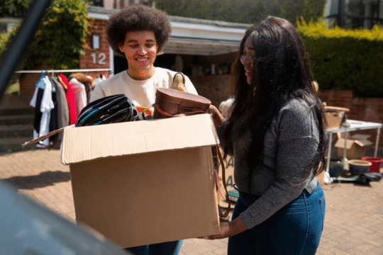 People carrying a gift box