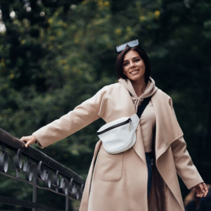 The Love Central - Effortless Elegance: 6 Must-Have Pieces for a Demure Look The Love Central - A lady dressed in a well-tailored trench coat