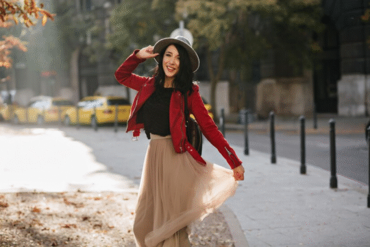 A pretty girl wearing a midi skirt and hat