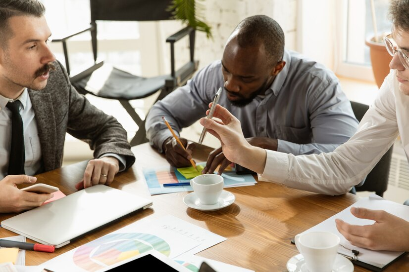 The Love Central - Practical Tips for Creating a Harmonious Work Culture The Love Central - Colleagues in a meeting