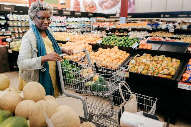 The Love Central - Senior woman with grocery shopping The Love Central -