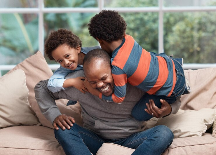 The Love Central - Father playing with kids