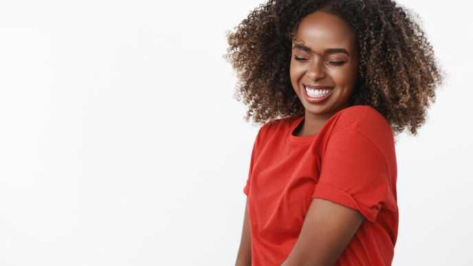 A smiling Afro young lady