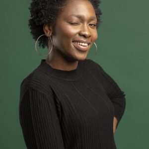 The Love Central - Diary of A Cheating Wife, Pt. 2: Bitter-Sweet Lust The Love Central - A afro lady with an eye wink