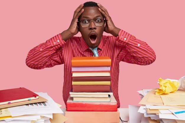 The Love Central - photo-astonished-black-man-keeps-hands-head-stares-with-overwhelmed-expression-has-read-all-books-exam-prepares-annual-report_273609-24708 The Love Central -