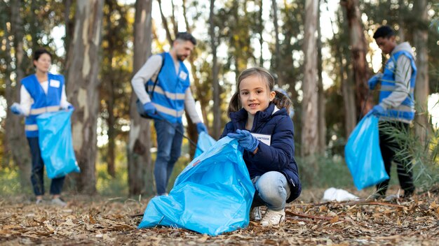 The Love Central - 7 Simple Ways Kids Can Learn Kindness at Home The Love Central - Kids engaging in volunteering