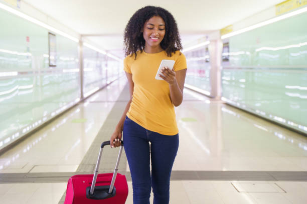 The Love Central - 10 Mistakes to Avoid When Planning Your Christmas Trip to Africa A lady traveling