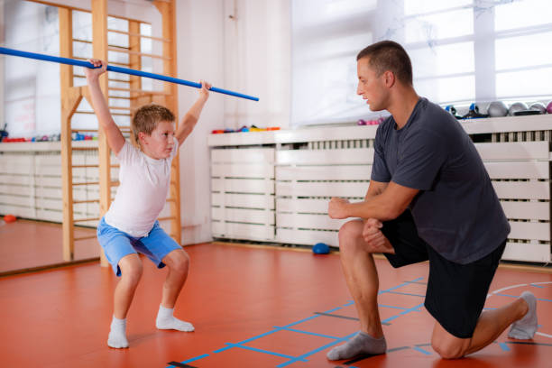 The Love Central - The Importance of Strong Male Role Models in Raising Boys The Love Central - Father and son exercising