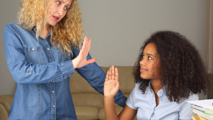 Girl saying no to her mom