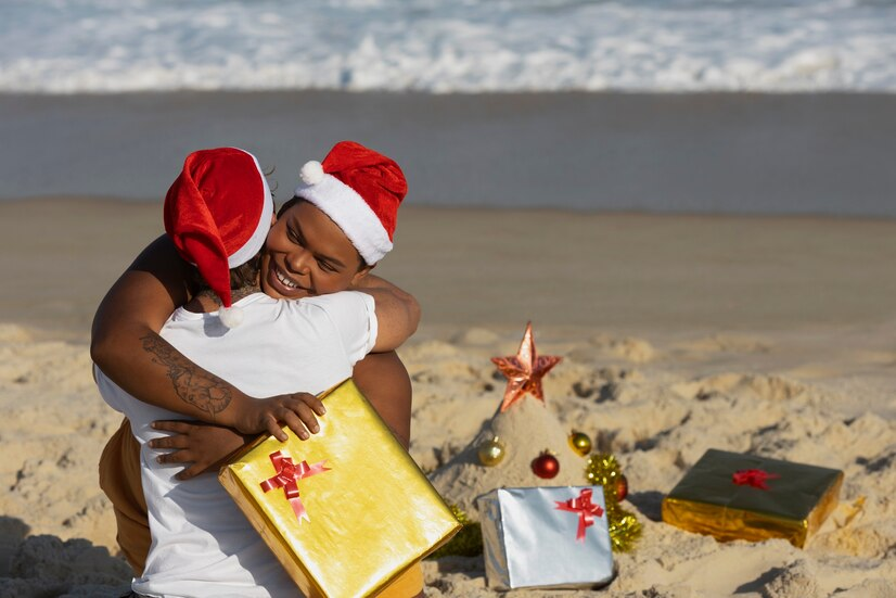 The Love Central - Couple hugging by the beach