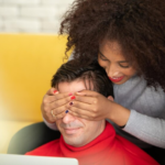 The Love Central - Lady covering her man's eyes