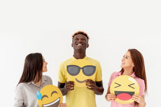 Friends holding emojis