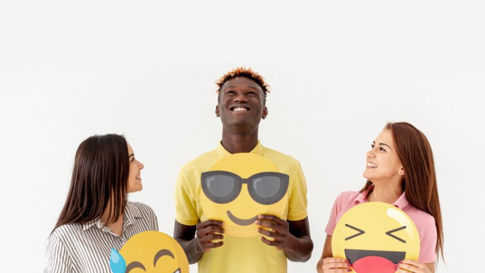 Friends holding emojis