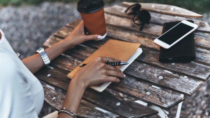 An individual about to journal