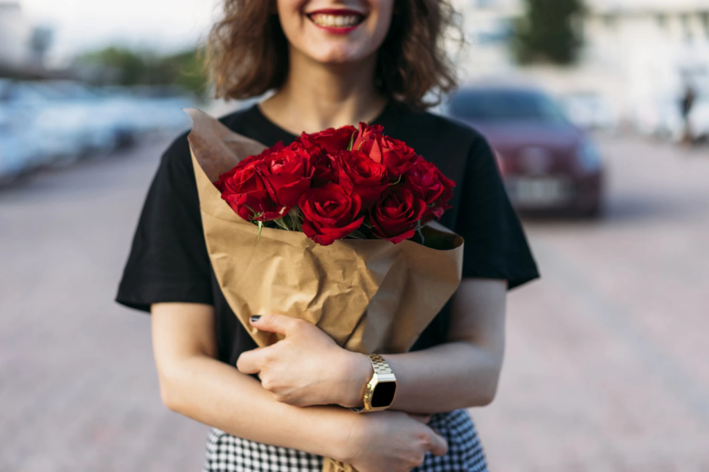 The Love Central - Being Single on Valentine’s Day? Here’s Why It’s Actually the Ultimate Flex The Love Central - A lady with a baquette of rose