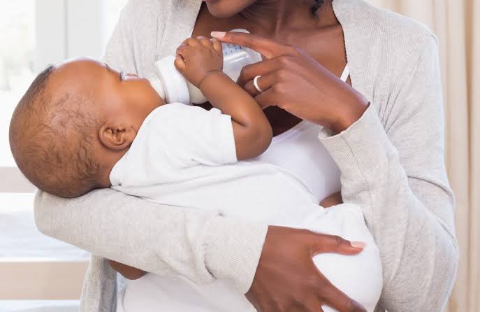The Love Central - Maternal Connection: Why Children Choose Mom First The Love Central - A mom feeding her baby